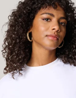 Hammered Oval Hoop Oorbellen Goud